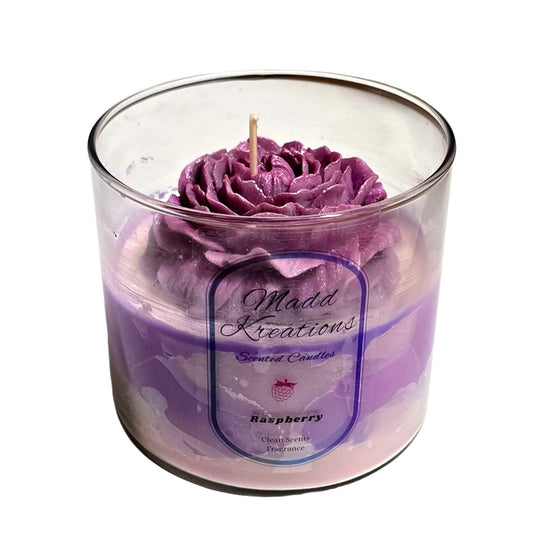 Raspberry Rose hand-poured soy candle in glass jar with purple rose wax topper by Madd Kreations
